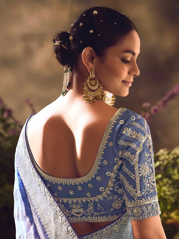 Blue banarasi tissue saree with intricate traditional work