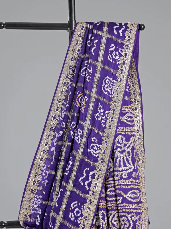 Blue bandhani saree with traditional embroidery