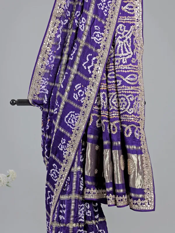 Blue bandhani saree with traditional embroidery