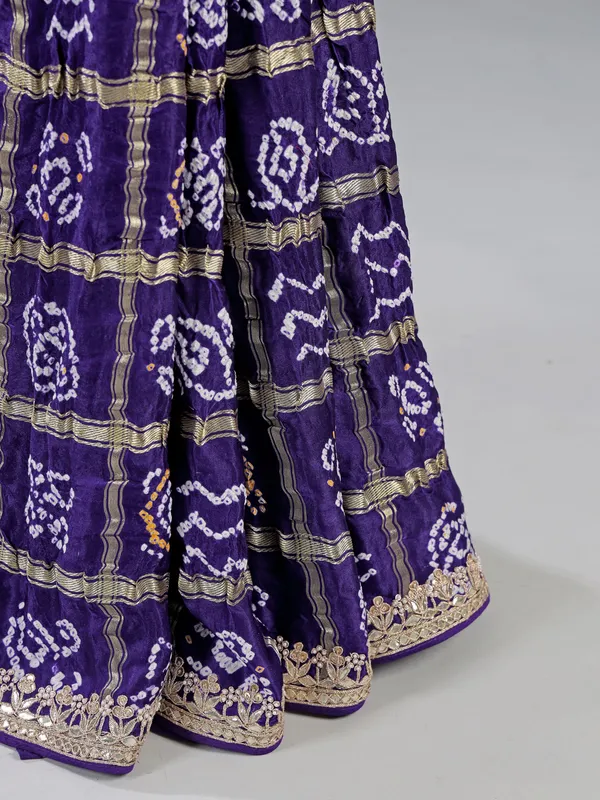 Blue bandhani saree with traditional embroidery