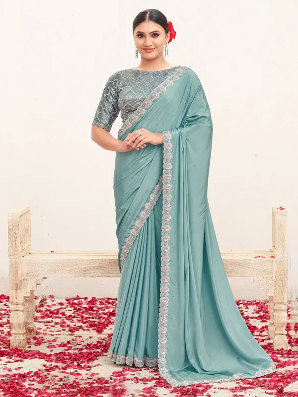 Blue crepe saree with stones and resham detailing