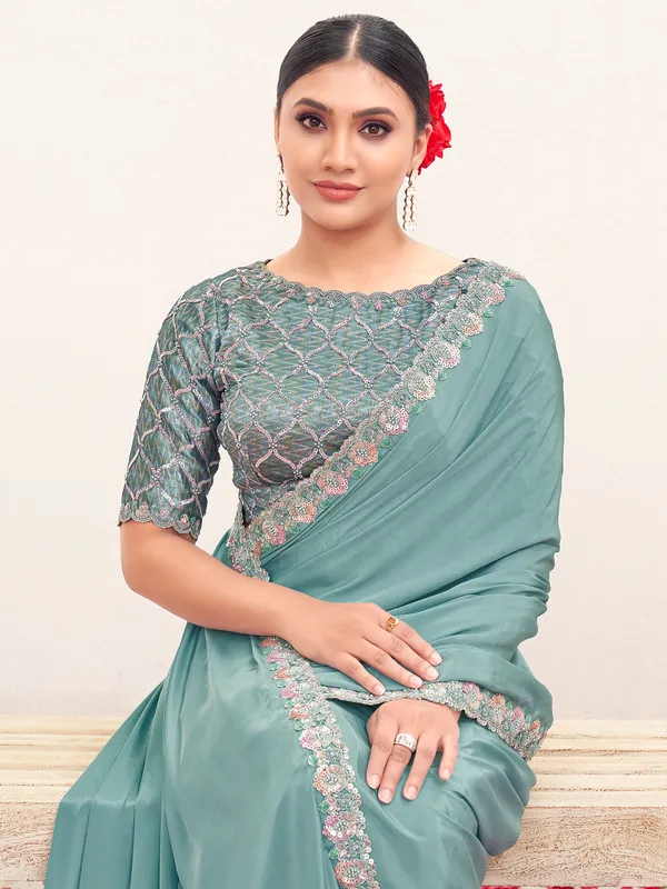 Blue crepe saree with stones and resham detailing