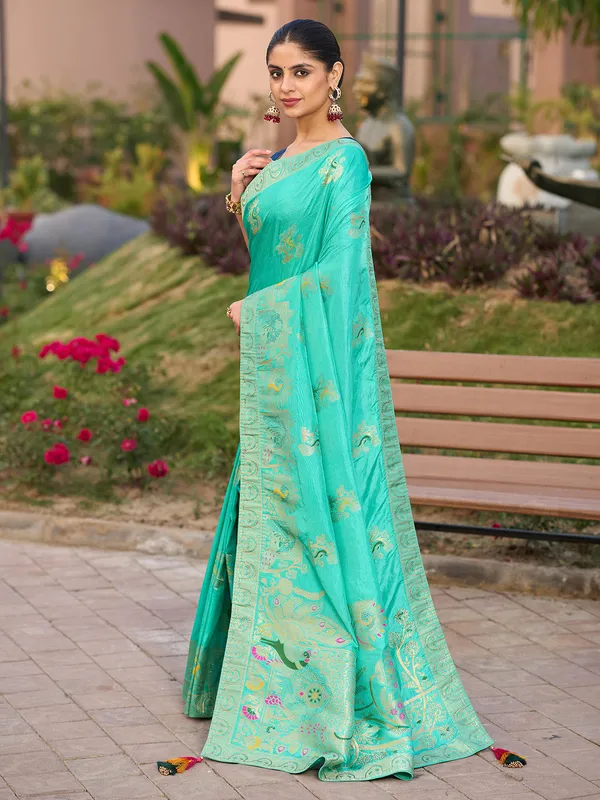 Blue dola silk saree with stone zari weaving