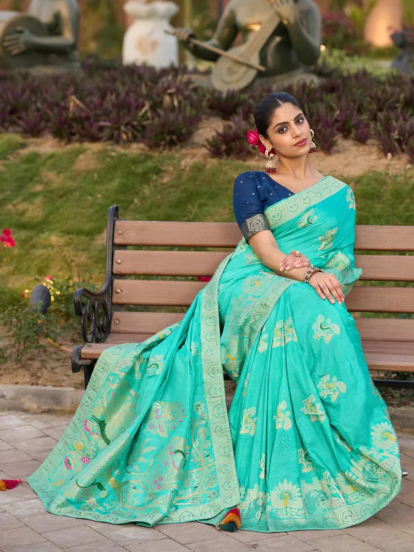 Blue dola silk saree with stone zari weaving