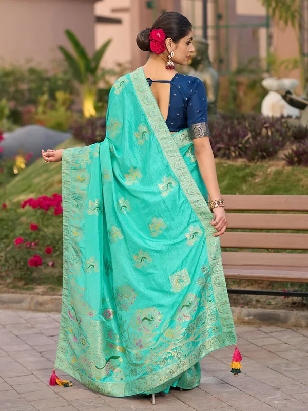 Blue dola silk saree with stone zari weaving