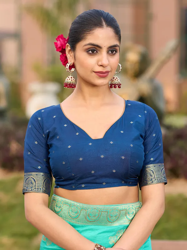 Blue dola silk saree with stone zari weaving