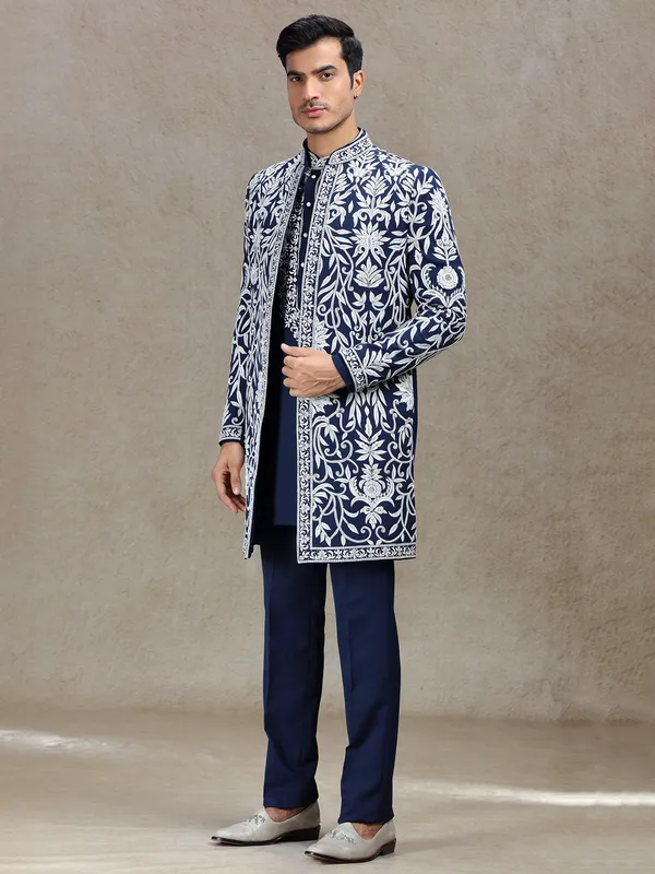 Blue long jacket style indo-western in rich work