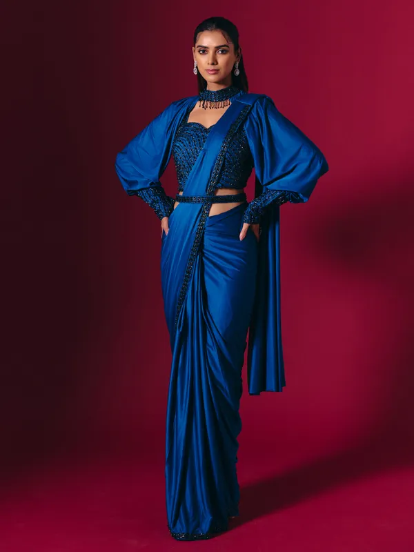 Blue lycra saree adorned with cutdana and pearls work