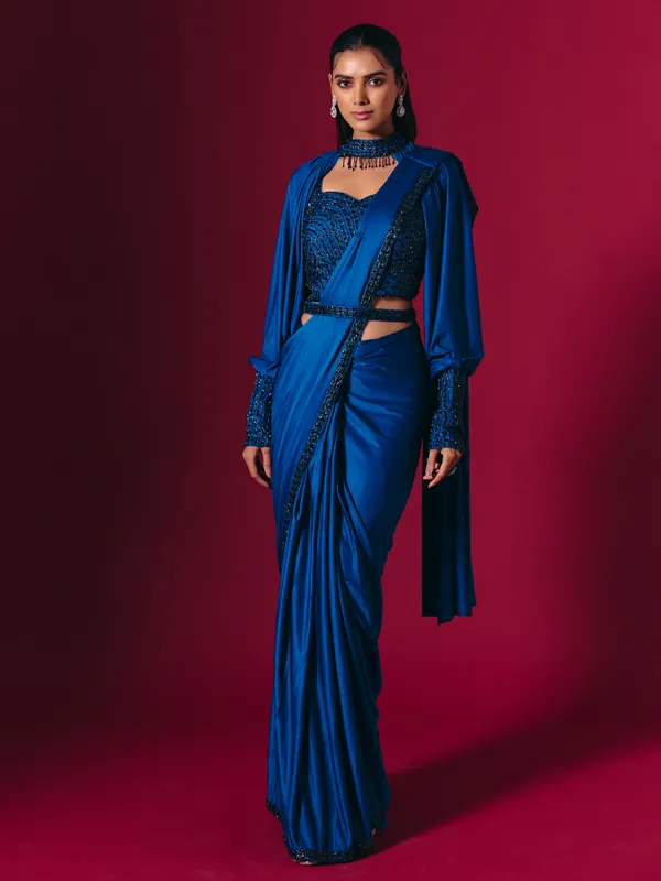 Blue lycra saree adorned with cutdana and pearls work