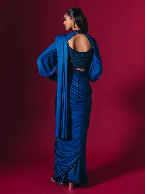 Blue lycra saree adorned with cutdana and pearls work