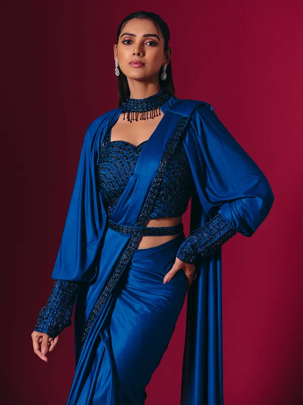 Blue lycra saree adorned with cutdana and pearls work