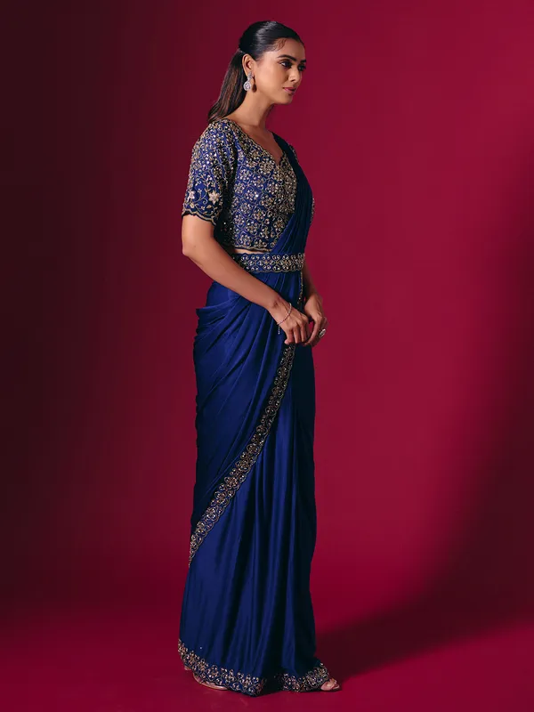 Blue lycra saree enhanced with sequins and cutdana work