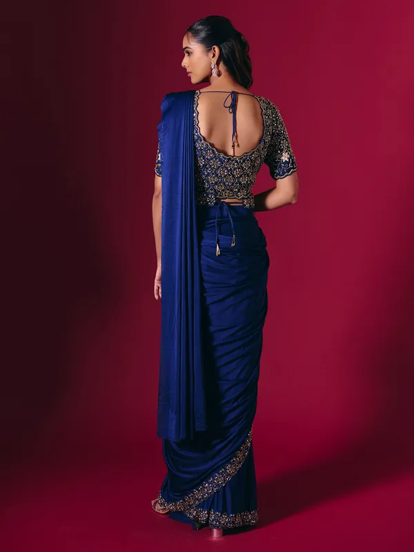Blue lycra saree enhanced with sequins and cutdana work