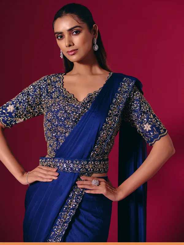 Blue lycra saree enhanced with sequins and cutdana work