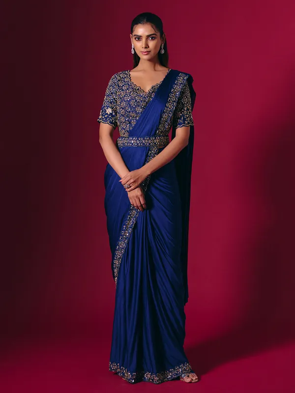 Blue lycra saree enhanced with sequins and cutdana work