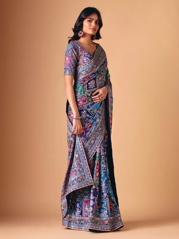 Blue modal silk colorful motif embellished saree