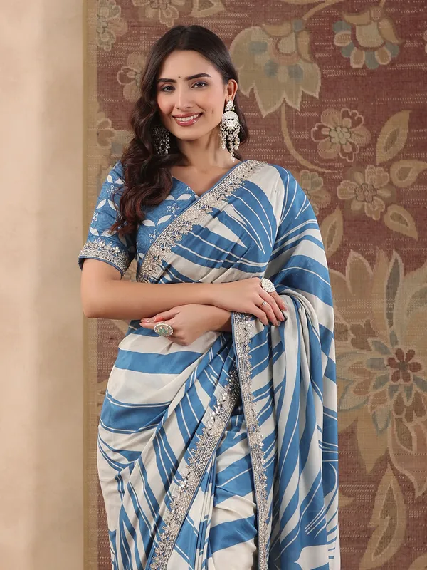 Blue muslin printed saree for festive