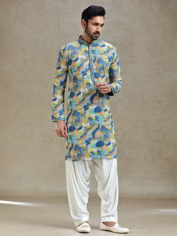 Blue printed kurta salwar set in textured embroidery
