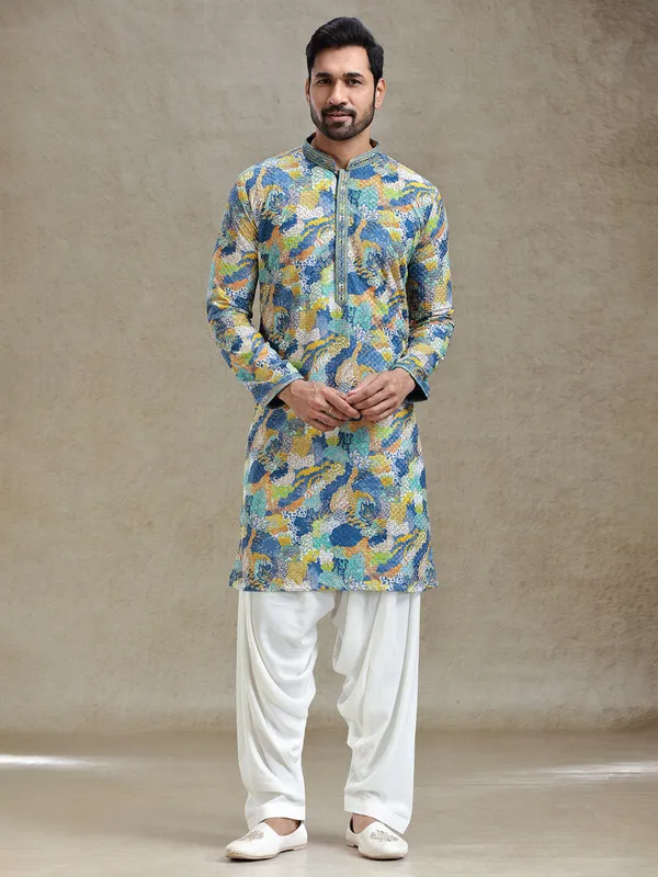 Blue printed kurta salwar set in textured embroidery
