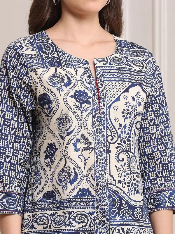 Blue printed short kurti with thread work
