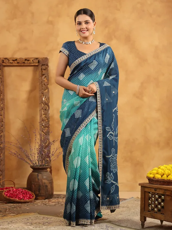 Blue printed silk saree with resham and sequins work