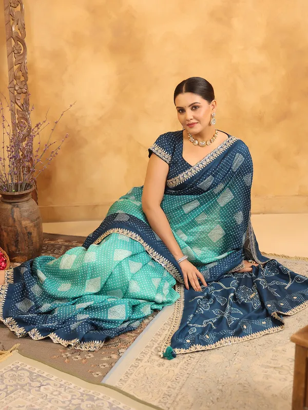 Blue printed silk saree with resham and sequins work
