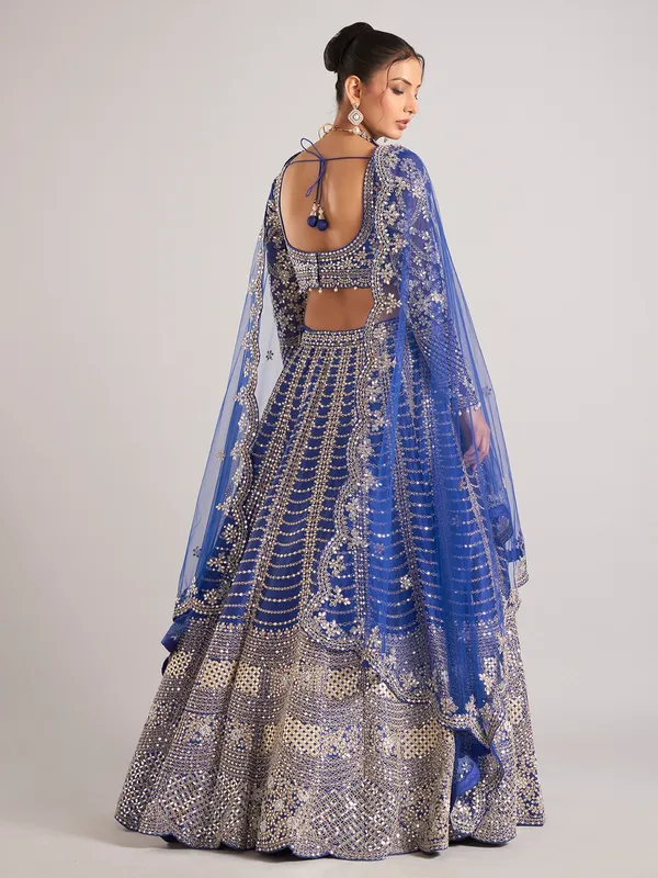 Blue raw silk lehenga choli with mirror work