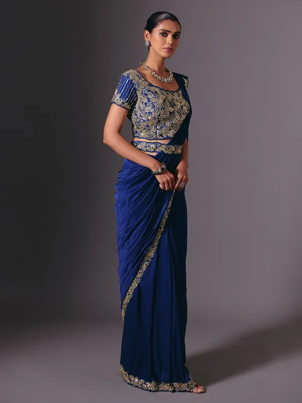 Blue satin lycra saree with sparkling festive embellishments