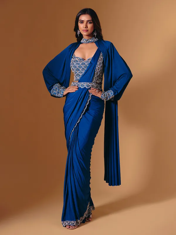 Blue satin saree with refined cutdana and pearl work