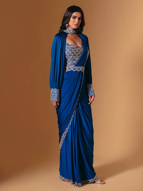 Blue satin saree with refined cutdana and pearl work
