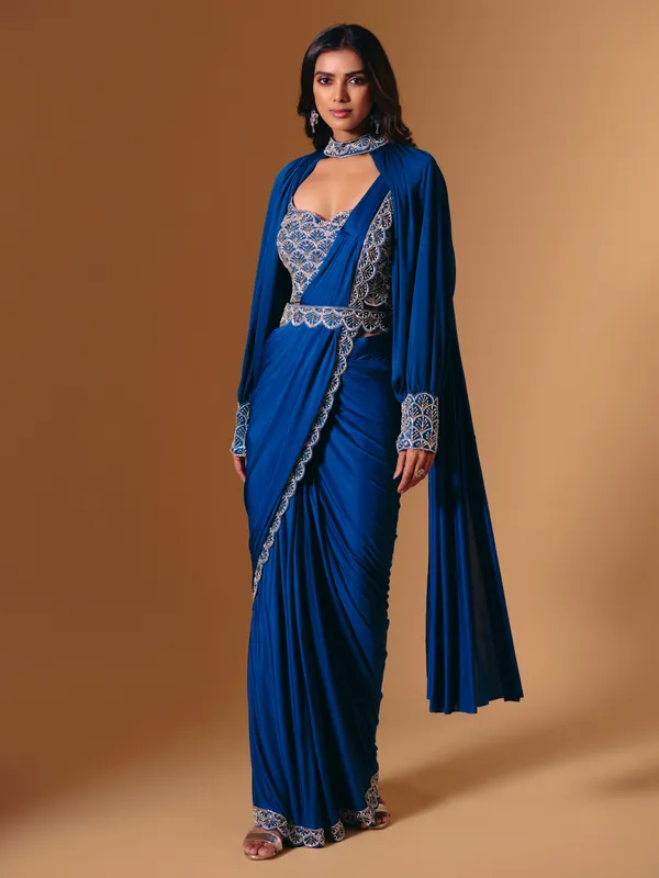 Blue satin saree with refined cutdana and pearl work