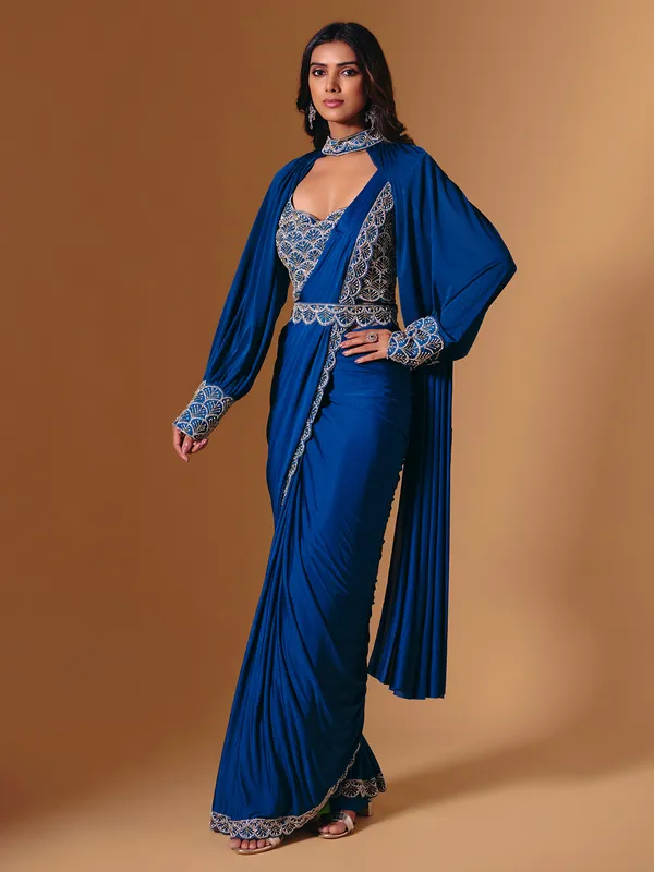 Blue satin saree with refined cutdana and pearl work