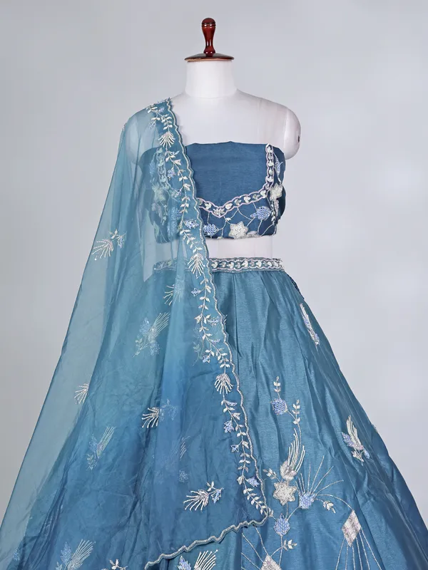 Blue silk lehenga choli with zardosi and beads work