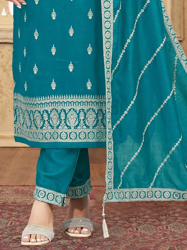 Blue silk salwar suit with zardosi and stone accents