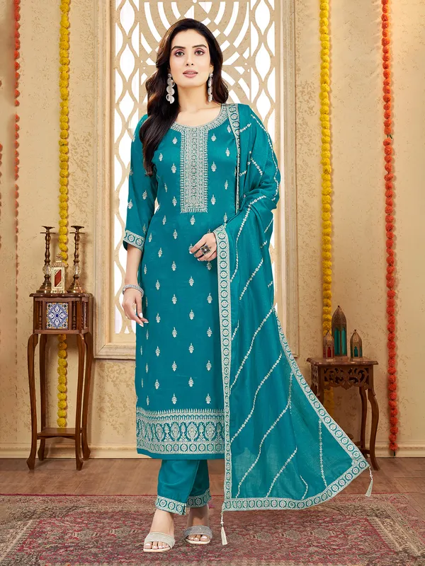 Blue silk salwar suit with zardosi and stone accents
