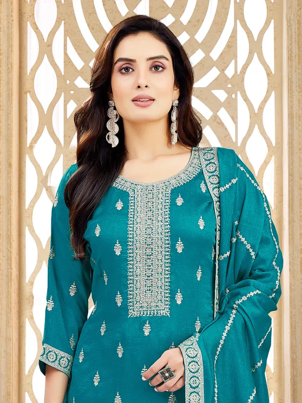 Blue silk salwar suit with zardosi and stone accents