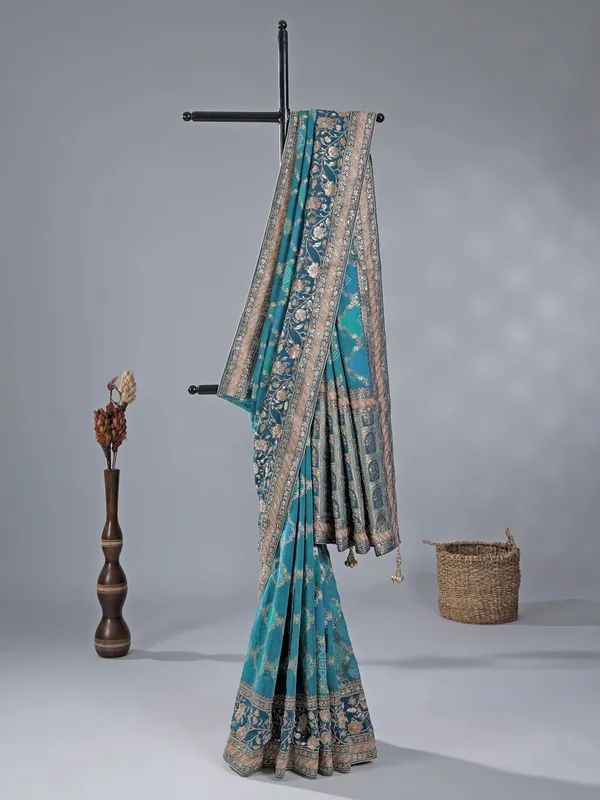 Blue silk wedding wear saree with zari details