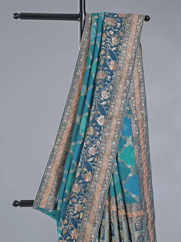 Blue silk wedding wear saree with zari details