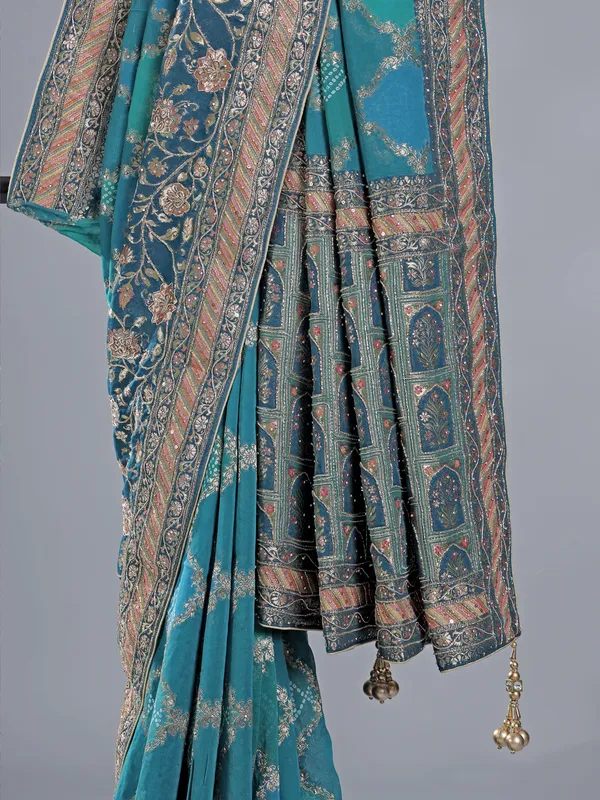 Blue silk wedding wear saree with zari details