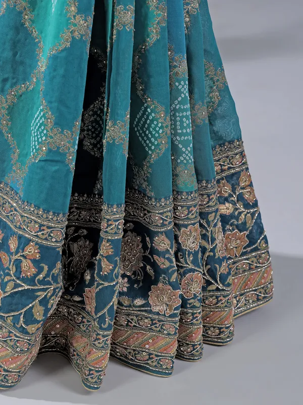 Blue silk wedding wear saree with zari details