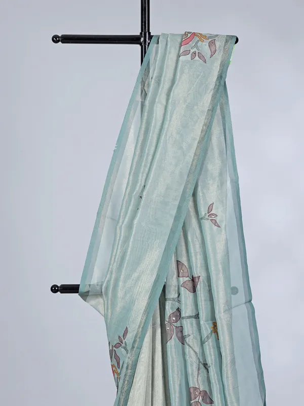 Blue tissue saree with printed detailing