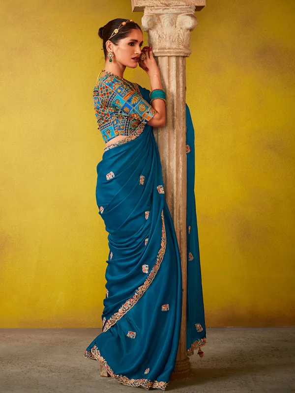 Blue tissue silk saree with sequins work