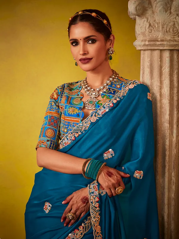 Blue tissue silk saree with sequins work