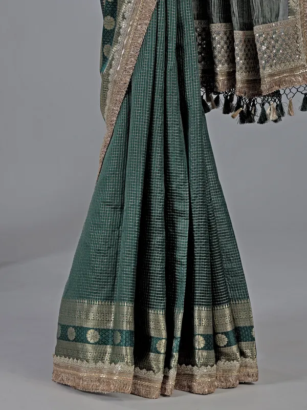 Bottle green dola silk saree with zari weaving