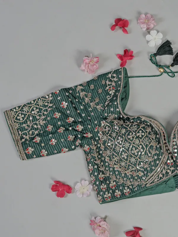 Bottle green dola silk saree with zari weaving