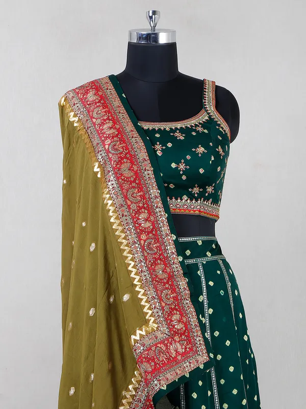 Bottle green satin lehenga choli for wedding