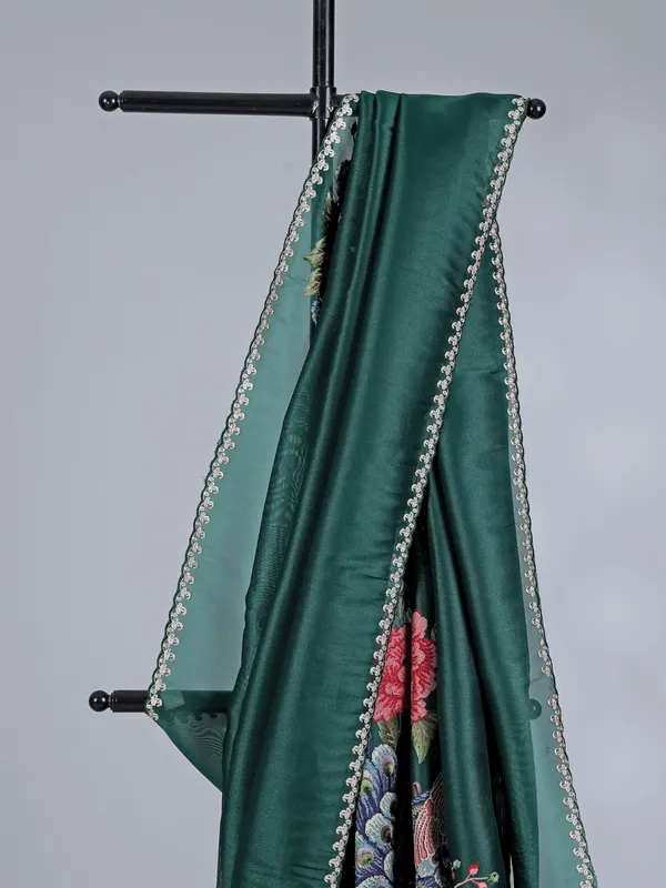 Bottle green tissue silk saree with peacock work
