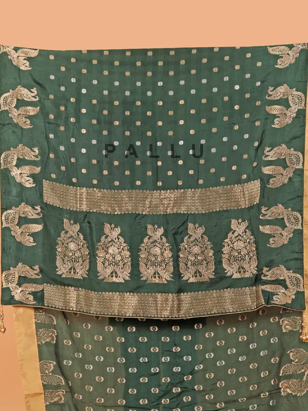 Bottle green zari weaving dola silk saree