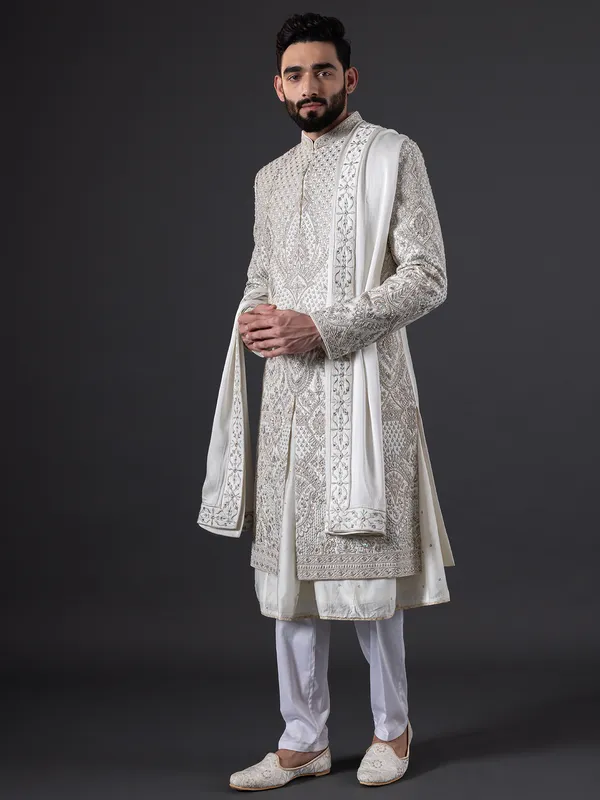 Breath taking pearl white sherwani in silk for groom