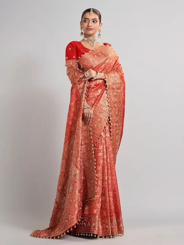 Bridal red kanjivaram silk saree with rich zari detailing